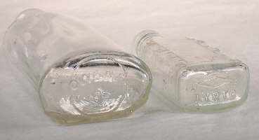 20th century machine-made "oval" druggist bottles; click to enlarge.