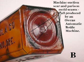 Close-up view of the base of the Celro-Kola bottle.